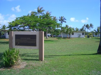 navy-base-housing-with-gravesite-sign-guam-jun-06.JPG