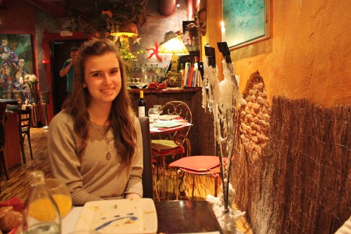 Logan at Isla del Tesoro. Interesting decor and a huge burning candle with years worth of wax