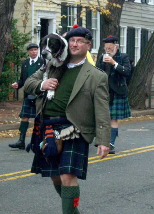 Men in Kilts with Dogs